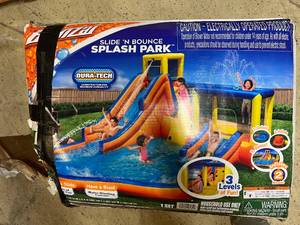 lot 32 image: Banzai Inflatable Slide N Bounce Splash Water Park