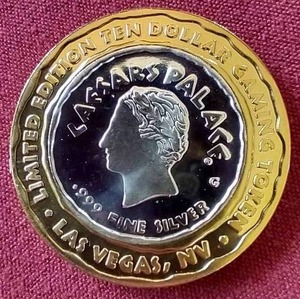 lot 4 image: Caesars Palace Silver Strike $10 Las Vegas Gaming Token