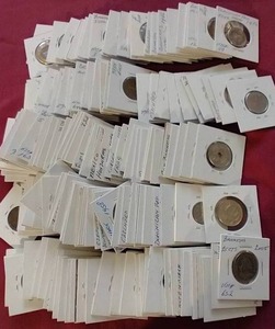 lot 6 image: 2.5 lb. Bag of Foreign Coins in Flips
