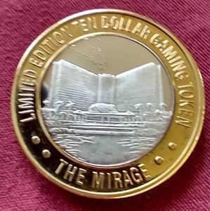 lot 24 image: The Mirage Silver Strike $10 Las Vegas Gaming Token