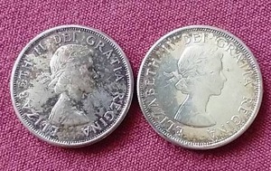 lot 51 image: (2) Silver Canadian 50 Cent Coins