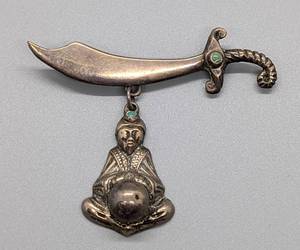 lot 67 image: Sterling Silver Fortune Teller Brooch from Mexico
