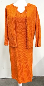 lot 97 image: St. John Orange Sweater and Dress Set