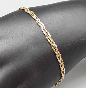 lot 209 image: Delicate 14k Gold Three Tone Braided Bracelet
