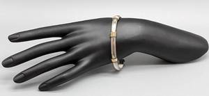lot 204 image: Artisan Crafted Sterling Silver and 14k Yellow Gold Cuff Bracelet