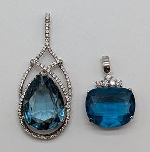 lot 75 image: Two Stauer Blue Stone and Sterling Silver Pendants