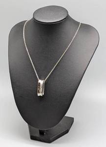 lot 18 image: Tiffany and Co. Sterling Silver Oval Loop Pendant and Chain