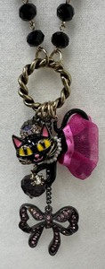 lot 159 image: Betsy Johnson Cat with Tutu and Bling Bow Long Necklace