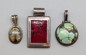 lot 132 image: Three Sterling and Stone Pendants