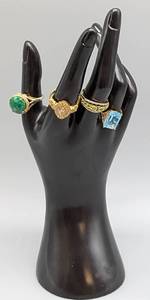 lot 150 image: Four Sparky Gold Tone Sterling Rings by Sauer