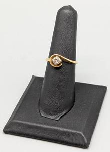 lot 152 image: 14k Yellow Gold and Diamond Wave Solitaire Ring