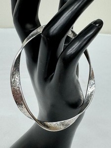 lot 220A image: Twisted Design Sterling Silver Bangle Bracelet
