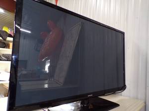 lot 10 image: Samsung 43 TV with Roku and Remotes