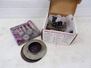 lot 50 image: Holly Carbuator with SS Engine Hose Sleeves
