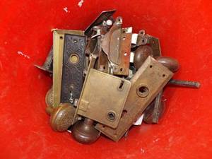 lot 52 image: Pail of Vintage door hardware