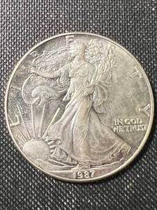 1987 AMERICAN SILVER EAGLE 1 TROY OZ .999 FINE SILVER