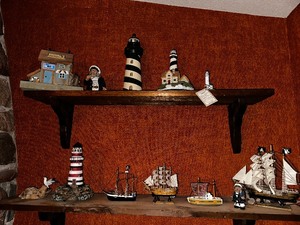 lot 13 image: Variety Of Vintage Sailboats And Lighthouses As Seen In Photo