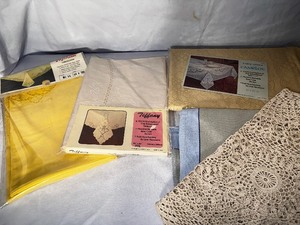 lot 57 image: Vintage Table Cloths New In Packaging