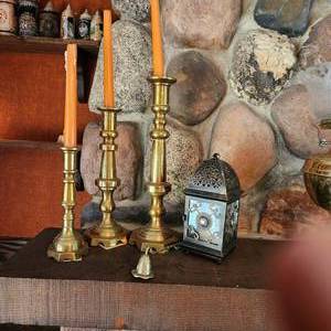 lot 19 image: Three Vintage Brass Candlesticks Measuring 8, 11, and 13 Inches