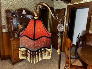 lot 90 image: Antique Dale Tiffany Floor Lamp With Beaded Maroon Shade In Excellent Condition, Measuring 64 Inches Tall