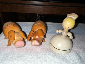 lot 130 image: Vintage Wood Pig Salt And Pepper Shakers And Angel Bell