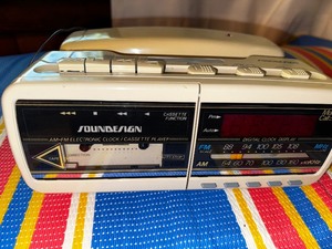 lot 133 image: Sound Design Morning Call Radio, Cassette Player, And Telephone Alarm Clock