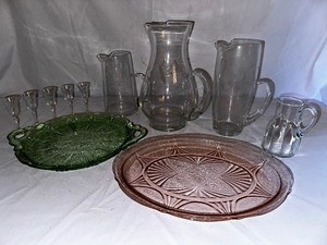 lot 181 image: Vintage Jeanette Green Cherry Blossom Green Handled Tray, Pink Depression Glass Lace Platter, Clear Glass Pitchers, and Apertif Glasses