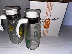 lot 185 image: Set of Two Vintage LemonLime Glass Refrigerator Pitchers