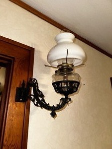 lot 206 image: Vintage Cast Iron Wall Sconce with Milk Glass Shade