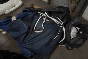 lot 98 image: pallet of tarp panels