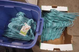 lot 21 image: large lot of plastic hangers