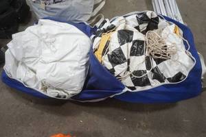 lot 77 image: Can Am display tarps