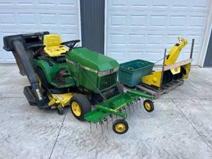 lot 7 image: John Deere 260 - Snowblower, Mower Deck, Bagger, Dethatcher