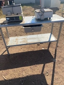 lot 4 image: Stainless Steel Table with drawer 5 ft with steel legs