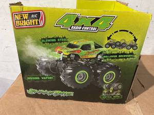 lot 213 image: New Bright (110) Snake Bite Radio Control Monster Truck with Lights, Sounds and Vapor 61061U