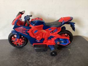lot 590 image: Spiderman 6V Motorcycle Ride on Toy, for Kids, Ages 3, Rechargeable Battery, up to 65lbs