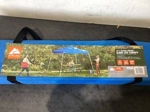 lot 592 image: Ozark Trail 10 x 10 Instant Slant Leg Pop-up Canopy Outdoor Shading Shelter, Blue