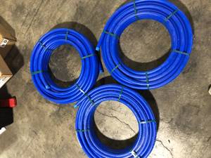 Lot of  Advanced Drainage Systems 1 in. x 100 ft. CTS 250 PSI NSF Poly Pipe in Blue   Customer Returns See Pictures
