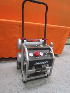 lot 42 image: Huskey Air Compressor