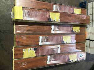 6 Boxes of TrafficMaster Jatoba 8 mm T x 5.6 in. W Laminate Wood Flooring (18.7 sqftcase) Customer Returns See Pictures