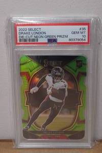 lot 4 image: 2022 Select Drake London Neon Green Prizm #35 Rookie Football Card - PSA 10