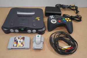 lot 12 image: Nintendo 64 Gaming Console with Controller, Memory Card and NFL Game