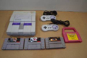 lot 16 image: Super Nintendo Gaming Console with 2 Controllers and 3 Games