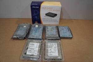 lot 21 image: High Speed DLS Modem and Hard Drives