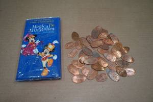 lot 141 image: Disney Penny Press Collection Book with Pennies