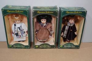 lot 177 image: 3 Signature Collection Petite Porcelain Dolls