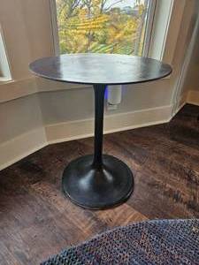 lot 24 image: Vintage Tulip-Style Black Accent Table