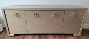 lot 41 image: Chic Contemporary Console Cabinet - Champagne with Gold Fixtures