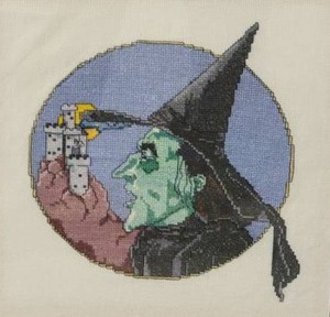 lot 131 image: Enchanting Framed Original Needlepoint - Wicked Witch of the West
