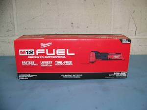 lot 23 image: Milwaukee Tool M12 FUEL Oscillating Multi-Tool - New in Box, comes with M12 Charger